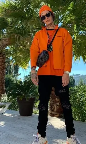 Kizaru wearing Supreme jacket