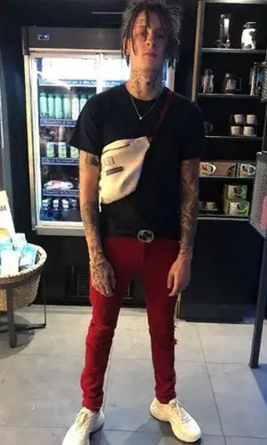Kizaru wearing Gucci belt
