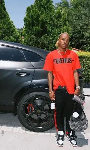 Rich The Kid wearing Dior backpack