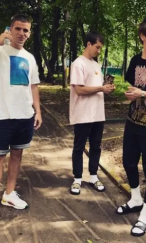 Платина wearing Nike pants