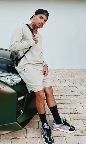 Rauw Alejandro wearing Nike sock