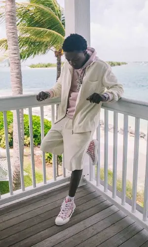 Jackboy wearing Dior shirt