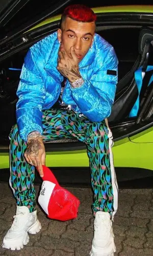 Sfera Ebbasta wearing Balenciaga top