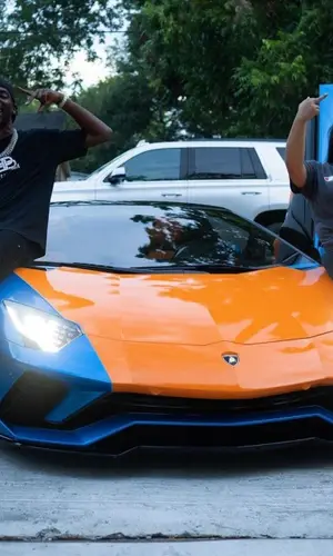 Young Dolph wearing New Era cap
