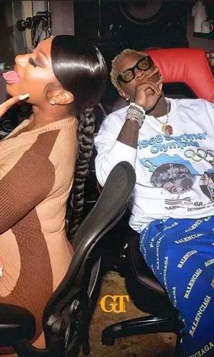 Young Thug wearing Do Not Disturb. sweatshirt