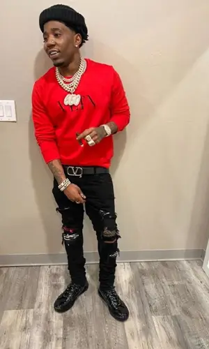 YFN Lucci wearing Valentino belt