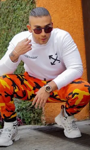 Manuel Turizo wearing Valentino pants