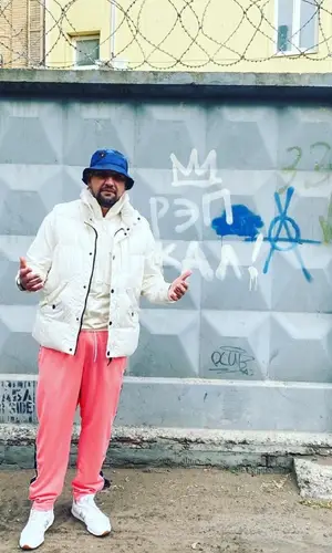 Баста wearing Bape hat