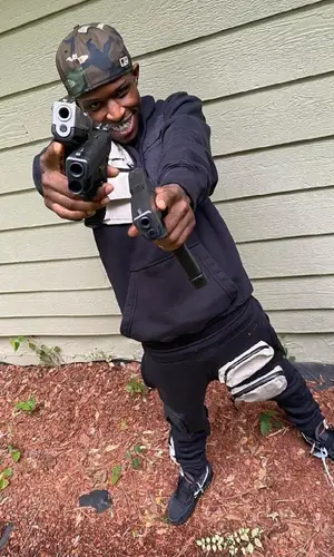 Quando Rondo wearing Nike hoody
