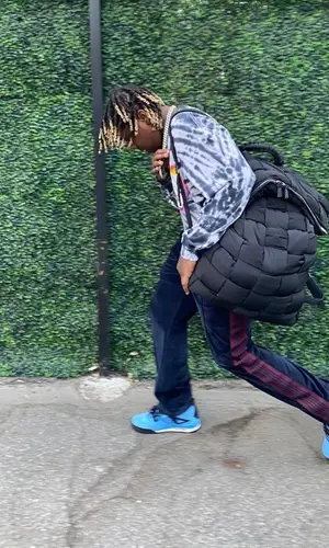Don Toliver wearing Needles pants