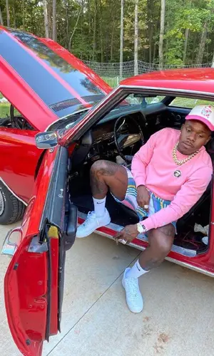 DaBaby wearing Aape sweatshirt