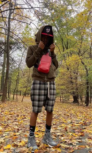 Yung Kayo wearing Rick Owens shorts
