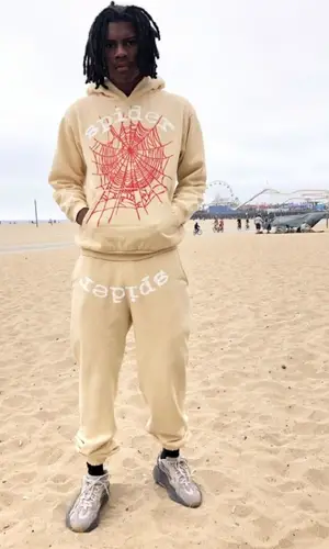 Yung Kayo wearing Spider Worldwide pants