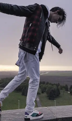 Тима Белорусских wearing Diesel jacket