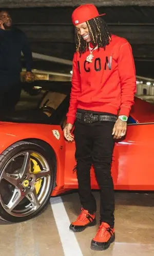King Von wearing Amiri jeans