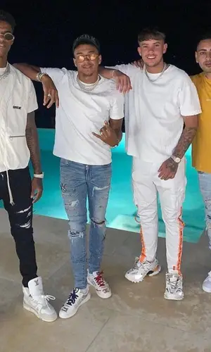 Marcus Rashford wearing Louis Vuitton boots