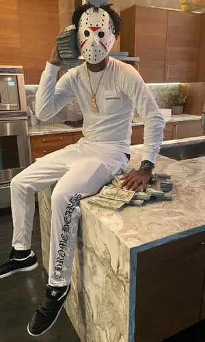 21 Savage wearing Chrome Hearts top