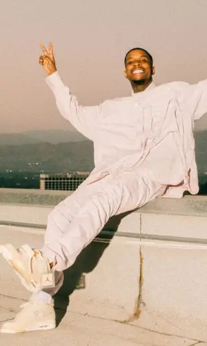 Tory Lanez wearing Louis Vuitton pants