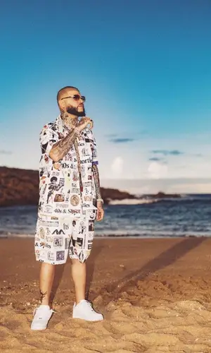 Farruko wearing 40s & Shorties shirt