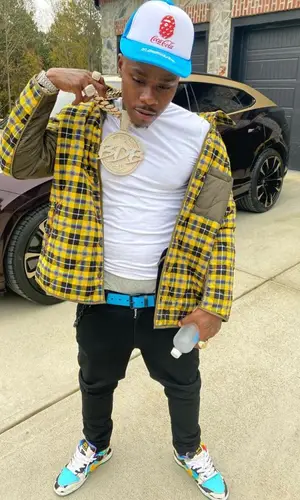 DaBaby wearing Louis Vuitton belt