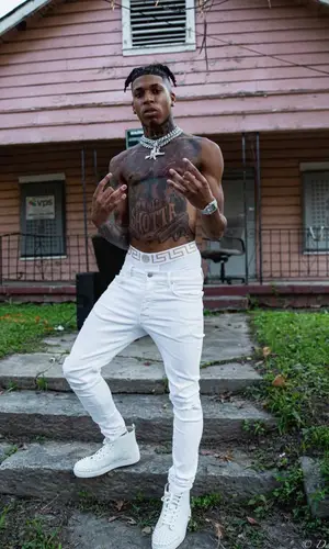 NLE Choppa wearing Versace other