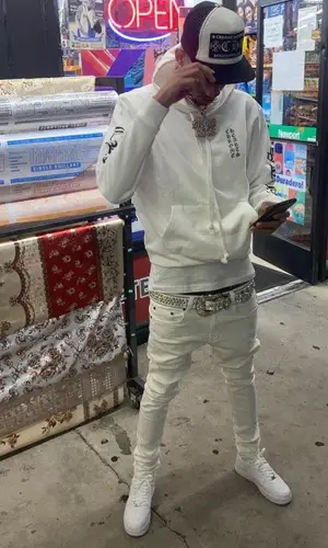 Stunna 4 Vegas wearing B.B. Simon other