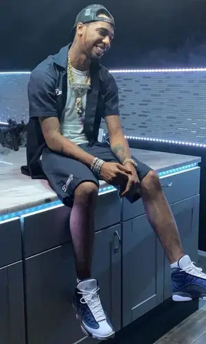 Key Glock wearing Dopeboy shirt