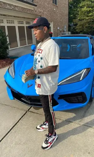 Rylo Rodriguez wearing Gucci trousers