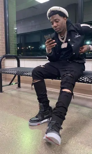 YFN Lucci wearing Louis Vuitton belt