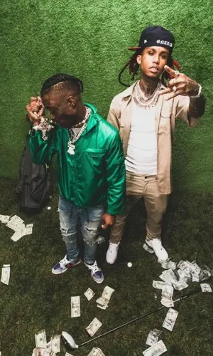 Lil Gnar wearing Dickies shirt