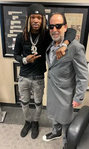 King Von wearing Amiri jeans