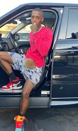 Famous Dex wearing Givenchy sweater