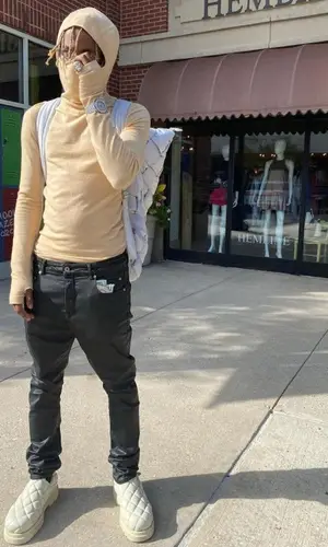 Rich The Kid wearing Bottega Veneta sweater