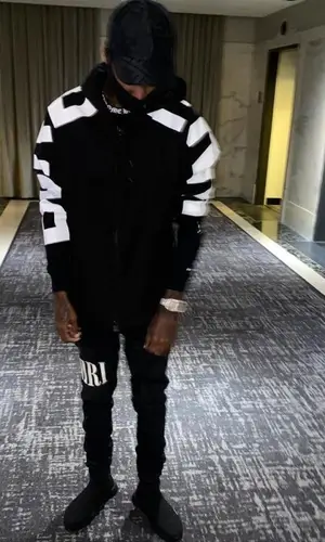 Lil Reese wearing Amiri jeans