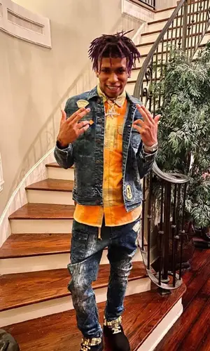 NLE Choppa wearing Dreamland shirt