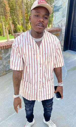 DaBaby wearing Gucci shirt