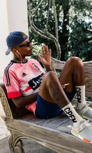 Pharrell Williams wearing Noah shorts