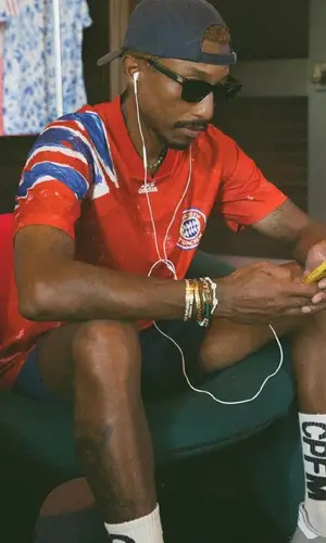 Pharrell Williams wearing Noah shorts