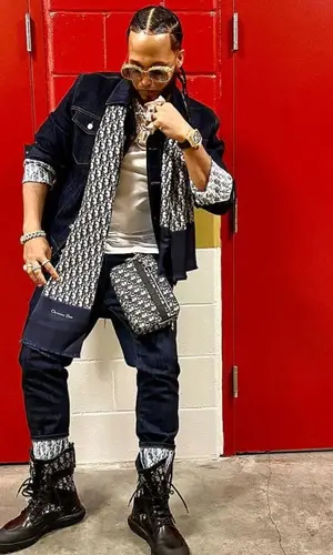 El Alfa El Jefe wearing Dior boots