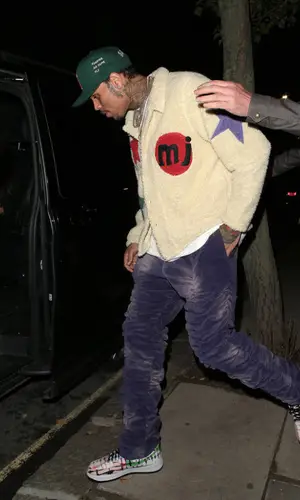 Chris Brown wearing Marc Jacques Burton pants