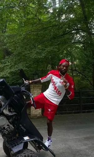 Meek Mill wearing Supreme jersey