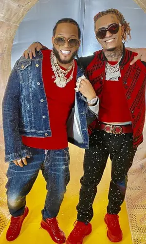 El Alfa El Jefe wearing Versace sweater