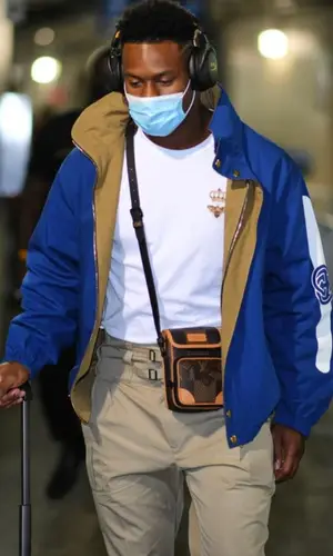 JuJu wearing Dolce & Gabbana t-shirt