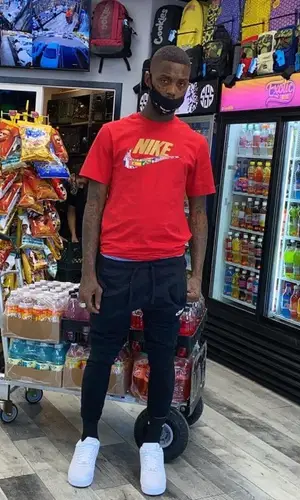 Famous Dex wearing Nike t-shirt