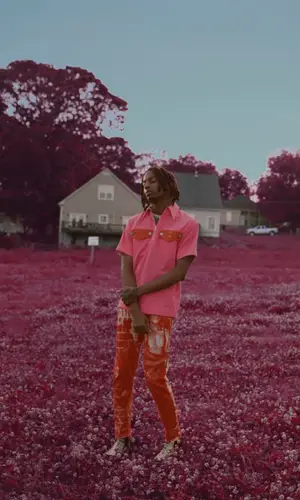 Playboi Carti wearing Calvin Klein shirt