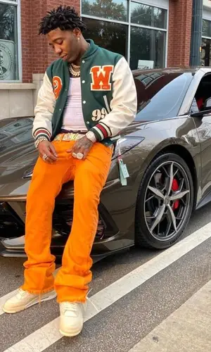 YFN Lucci wearing Louis Vuitton belt
