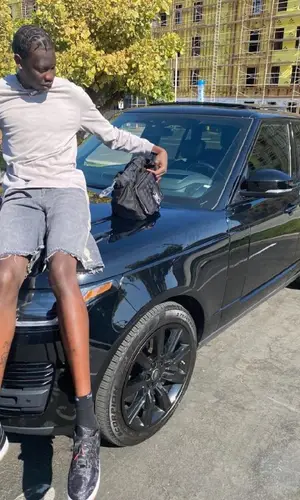 Bol Bol wearing Alyx bag