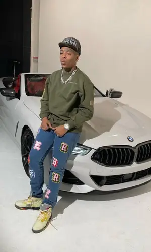 Lil Gotit wearing Alexander Spade other