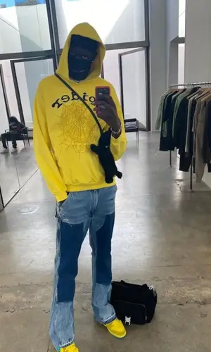 Bol Bol wearing Rick Owens bag