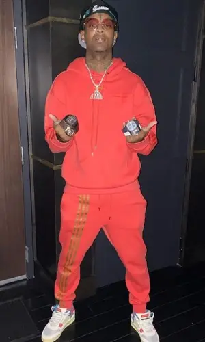 21 Savage wearing Adidas hoody